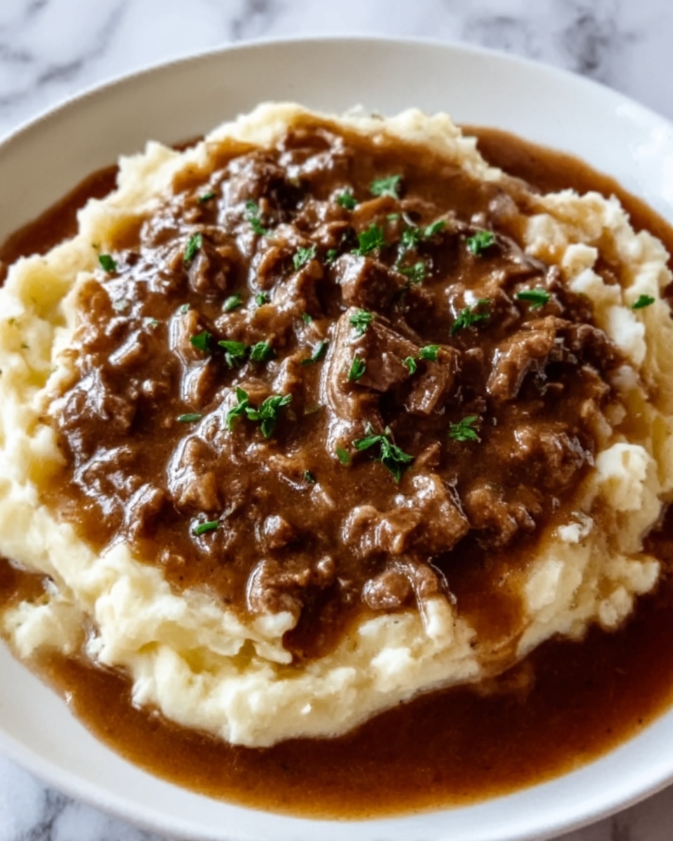 Ground Beef and Gravy Over Mashed Potatoes Recipe - Recipe Image