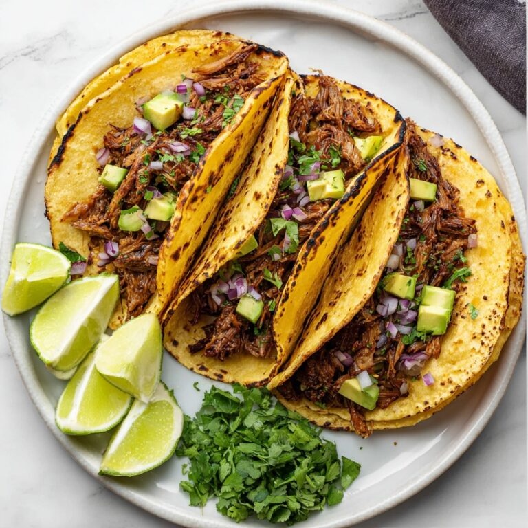 Crispy Slow Cooker Carnitas with Citrus Beer Broth Recipe