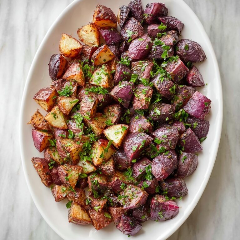 Roasted Purple Potatoes with Garlic, Herbs, and Fresh Basil Recipe